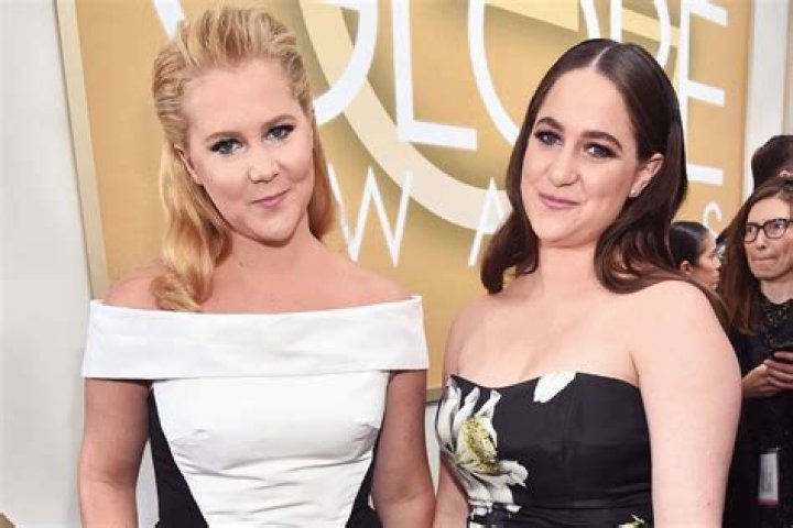 Amy Schumer and sister Kim arrive at 2016 Emmy Awards looking like
