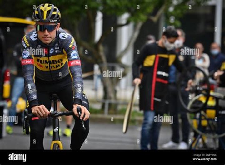 Belgian Wout Van Aert of Team JumboVisma, his wife Sarah De Bie and