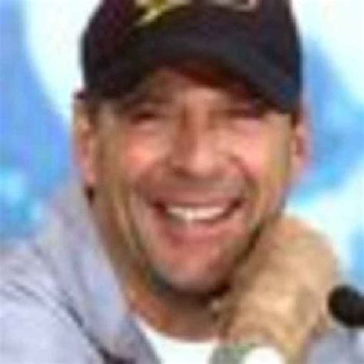 Bruce Willis sings and blows out candles as he celebrates 68th birthday