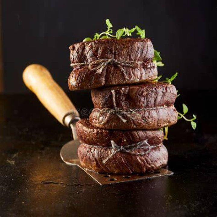 Gourmet thick juicy fillet steak medallions grilled to perfection and