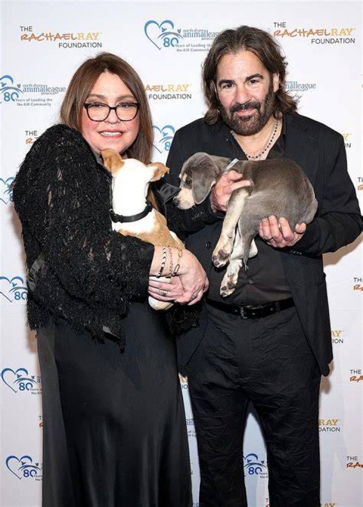 Is John Rachael Ray's husband?